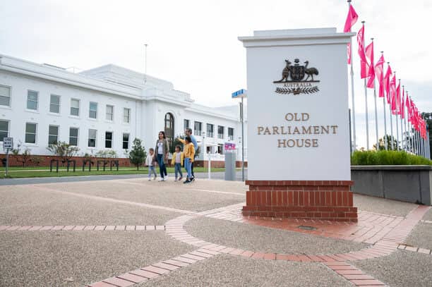 The sign of Old Parliament House in ACT, symbolising Canberra's rich political history, a factor in the pros and cons of living in Canberra.