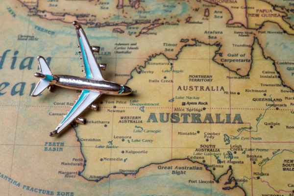 Map of Australia with a plane on top of it